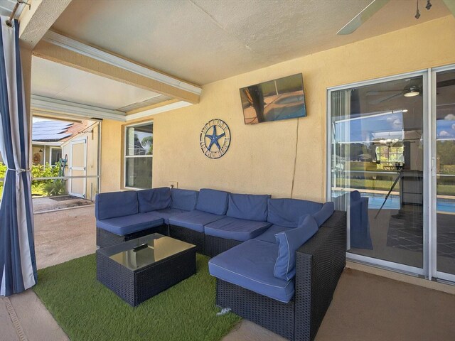 703 Sunridge Woods Blvd, Davenport, FL 33837 - living room featuring a textured wall and a textured ceiling