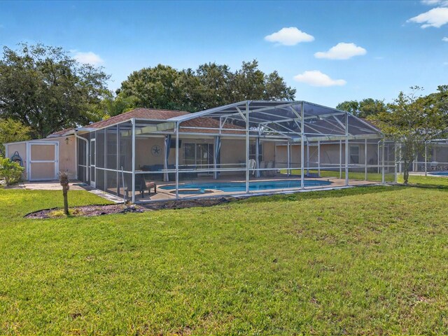 703 Sunridge Woods Blvd, Davenport, FL 33837 - outdoor pool with a yard and a lanai