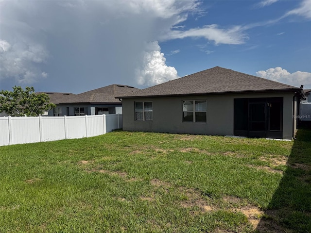 398 Citrus Isle Loop, Davenport, FL 33837 - rear view of property featuring stucco siding