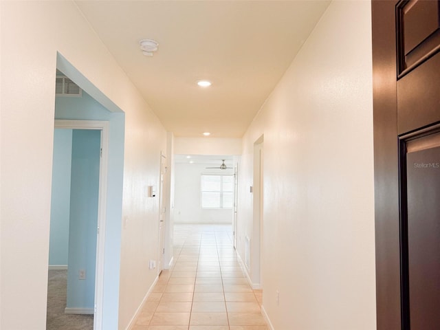 398 Citrus Isle Loop, Davenport, FL 33837 - corridor featuring baseboards, light tile patterned floors, and recessed lighting