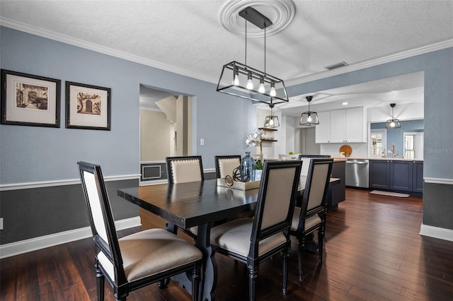 120 Springwood Trl, Altamonte Springs, FL 32714 - dining space featuring a textured ceiling, dark wood-type flooring, baseboards, and crown molding