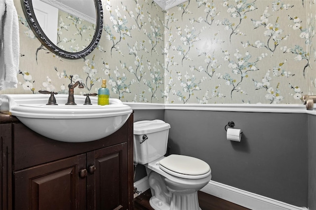 120 Springwood Trl, Altamonte Springs, FL 32714 - half bath featuring wallpapered walls, vanity, toilet, wood finished floors, and baseboards