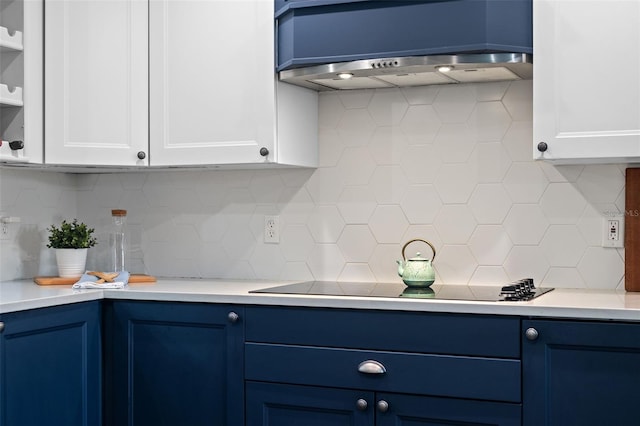120 Springwood Trl, Altamonte Springs, FL 32714 - kitchen featuring blue cabinetry, decorative backsplash, and wall chimney range hood