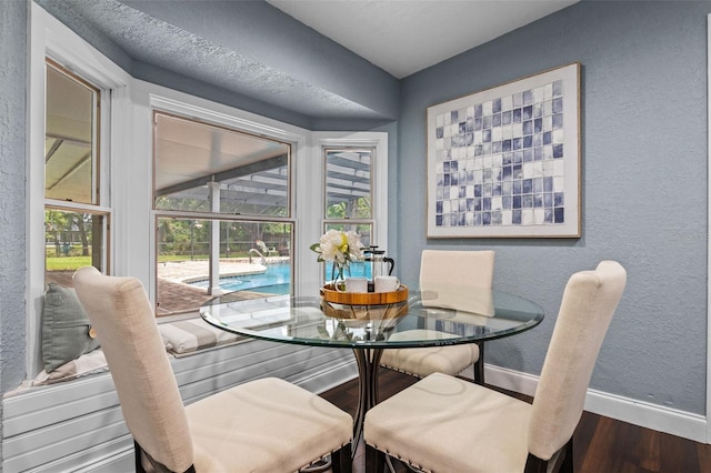 120 Springwood Trl, Altamonte Springs, FL 32714 - dining room with wood finished floors, baseboards, healthy amount of natural light, and a textured wall