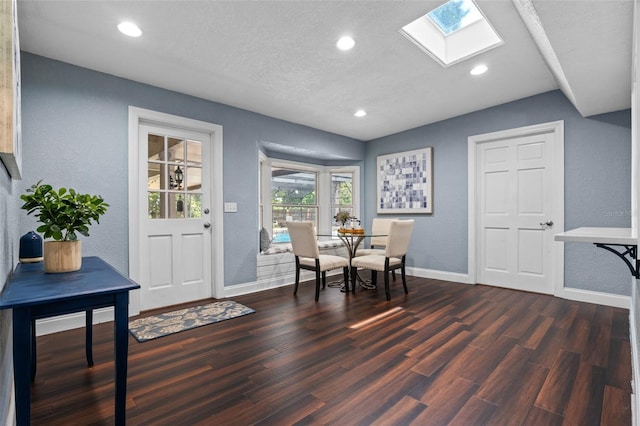 120 Springwood Trl, Altamonte Springs, FL 32714 - dining area featuring a skylight, dark wood finished floors, baseboards, recessed lighting, and vaulted ceiling