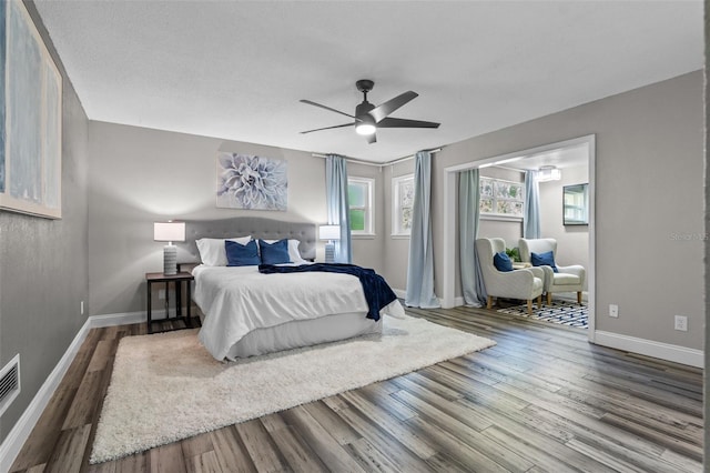 120 Springwood Trl, Altamonte Springs, FL 32714 - bedroom featuring wood finished floors, baseboards, and a ceiling fan