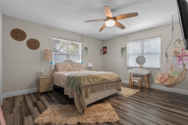 120 Springwood Trl, Altamonte Springs, FL 32714 - bedroom featuring wood finished floors, a textured ceiling, baseboards, and ceiling fan