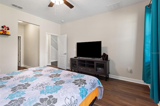 6333 Schoolhouse Pond Rd, Winter Garden, FL 34787 - bedroom featuring dark wood finished floors, baseboards, and ceiling fan