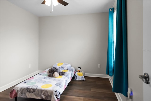 6333 Schoolhouse Pond Rd, Winter Garden, FL 34787 - bedroom featuring wood finished floors, baseboards, and a ceiling fan