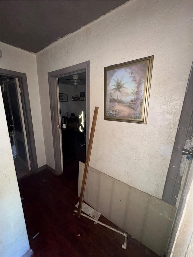 1500 43rd St, Orlando, FL 32839 - hallway featuring a textured wall and dark wood-type flooring