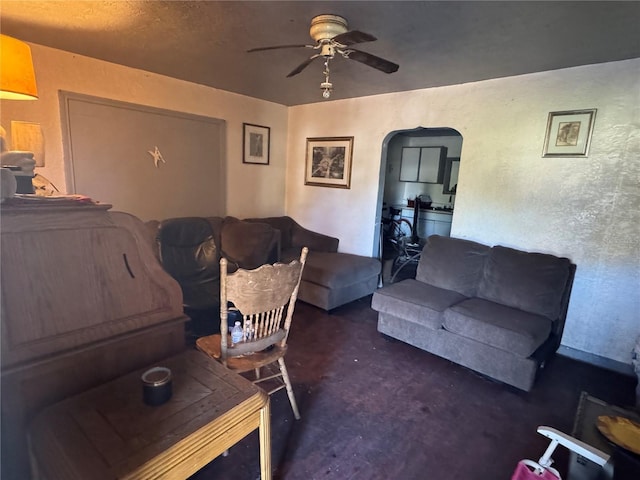 1500 43rd St, Orlando, FL 32839 - carpeted living room featuring ceiling fan and arched walkways
