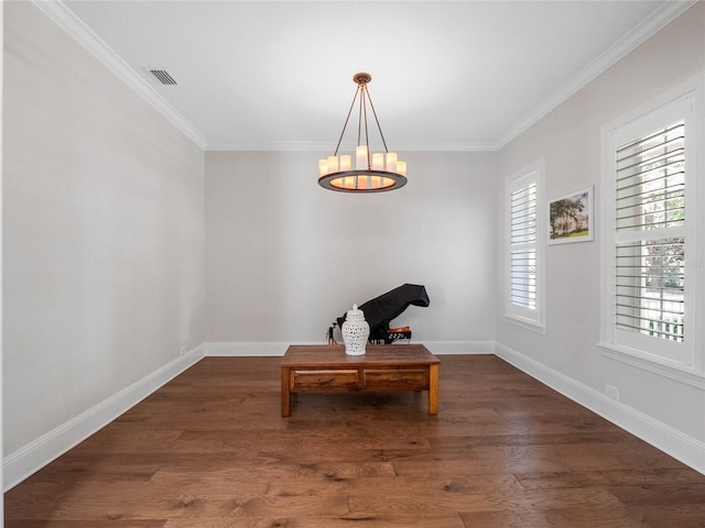 1438 Stickley Ave, Celebration, FL 34747 - sitting room with ornamental molding, wood finished floors, baseboards, and a chandelier