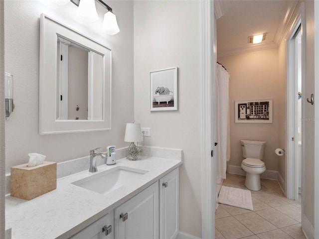 1438 Stickley Ave, Celebration, FL 34747 - bathroom featuring vanity, tile patterned flooring, crown molding, toilet, and baseboards