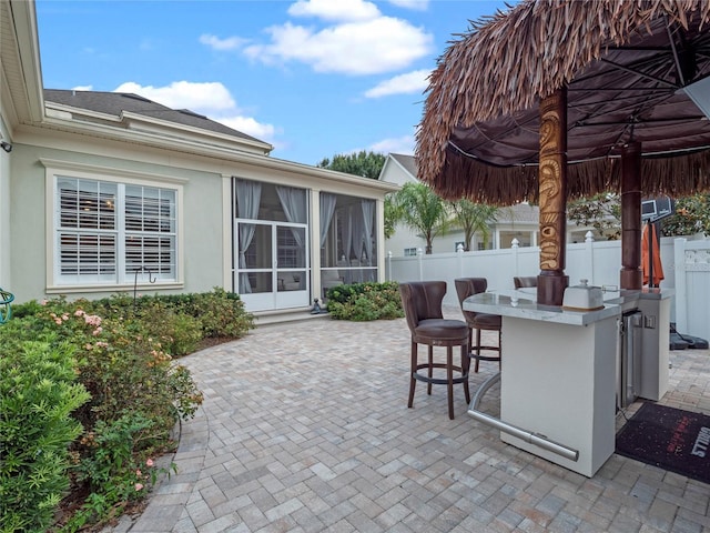 1438 Stickley Ave, Celebration, FL 34747 - view of patio / terrace featuring a sunroom