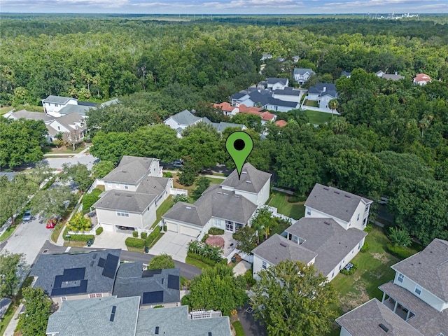 1438 Stickley Ave, Celebration, FL 34747 - aerial view of property's location featuring a forest and nearby suburban area