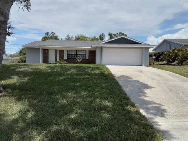 943 Millenbeck Ave, Deltona, FL 32725 - ranch-style house featuring an attached garage, driveway, and a front yard