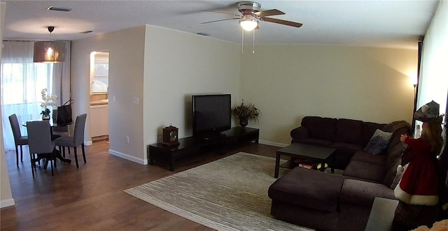 943 Millenbeck Ave, Deltona, FL 32725 - living room with a ceiling fan, wood finished floors, and baseboards