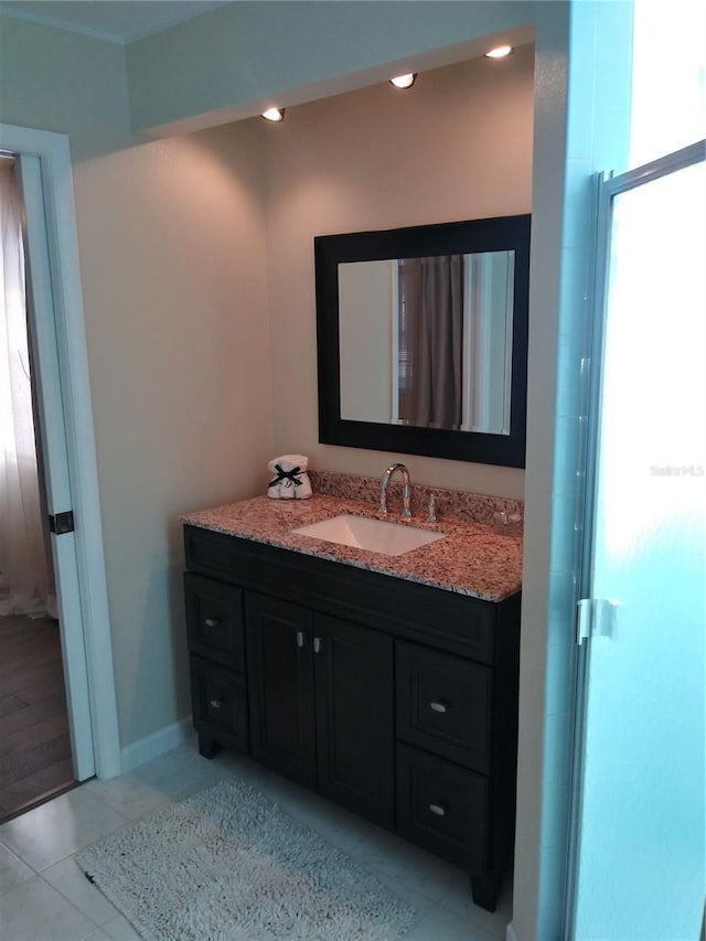 943 Millenbeck Ave, Deltona, FL 32725 - bathroom featuring vanity and baseboards