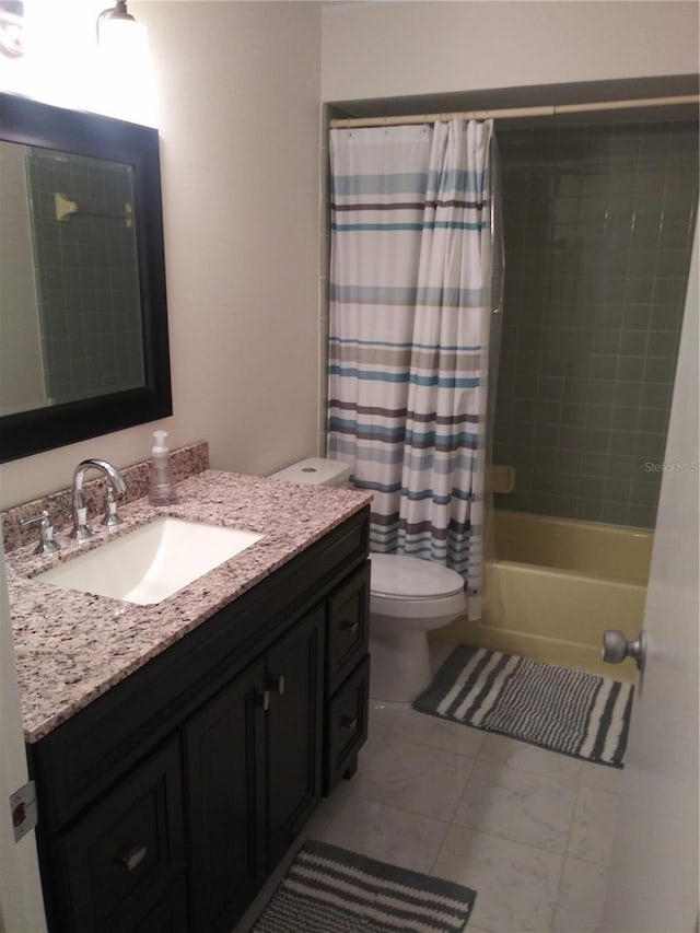 943 Millenbeck Ave, Deltona, FL 32725 - full bathroom featuring vanity, toilet, and shower / bath combo with shower curtain