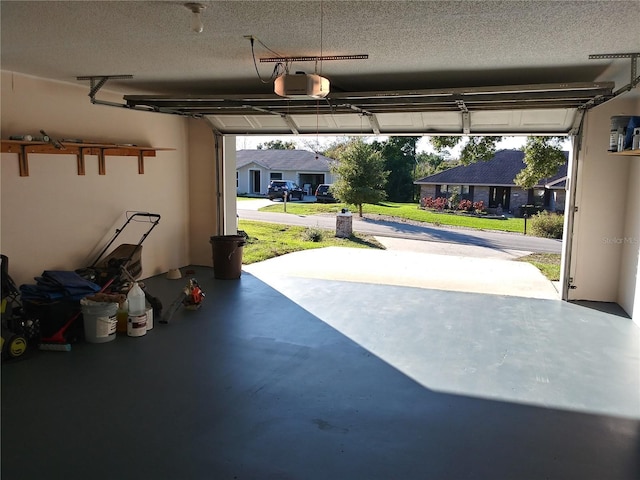 943 Millenbeck Ave, Deltona, FL 32725 - garage featuring a garage door opener