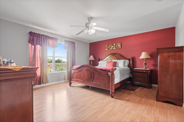 314 Edgewood Ct, Kissimmee, FL 34759 - bedroom with wood finished floors, baseboards, and ceiling fan