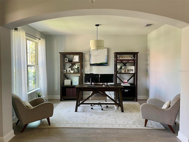 302 Coco Plum Ct, Oldsmar, FL 34677 - home office featuring baseboards and wood finished floors