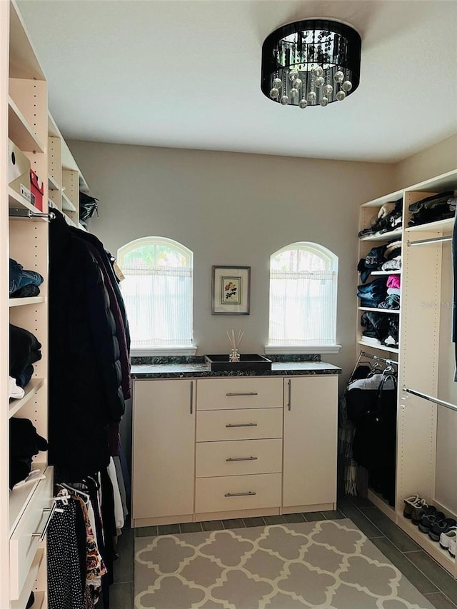 302 Coco Plum Ct, Oldsmar, FL 34677 - walk in closet with light tile patterned floors