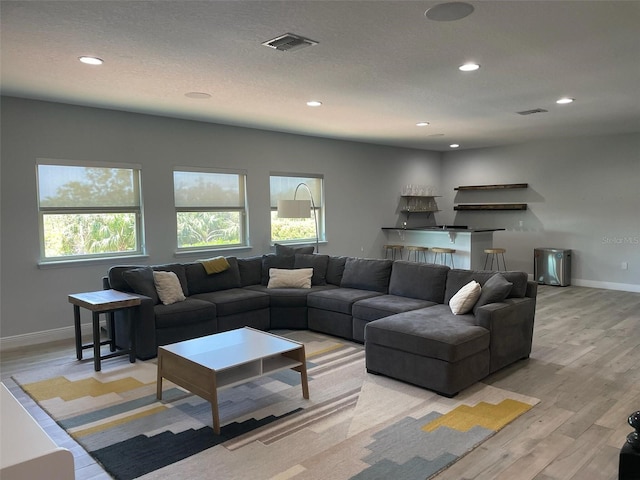 302 Coco Plum Ct, Oldsmar, FL 34677 - living area with light wood-type flooring, recessed lighting, and baseboards