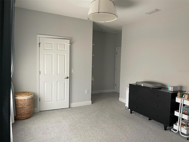 302 Coco Plum Ct, Oldsmar, FL 34677 - bedroom featuring light colored carpet and baseboards