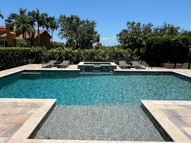 302 Coco Plum Ct, Oldsmar, FL 34677 - view of pool featuring a pool with connected hot tub and a patio