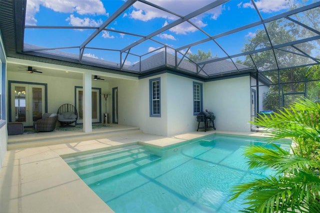 11721 Camden Park Dr, Windermere, FL 34786 - swimming pool with ceiling fan, a patio, a grill, and a lanai