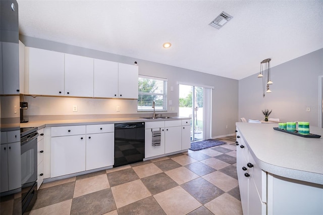 146 Hidden Pointe Ln, Groveland, FL 34736 - kitchen with black appliances, a sink, light countertops, white cabinetry, and recessed lighting