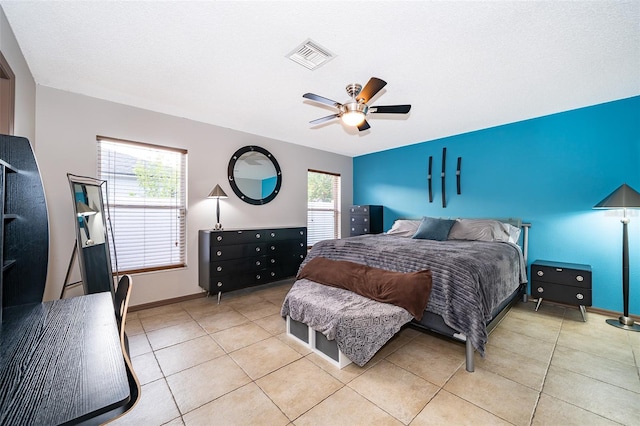 146 Hidden Pointe Ln, Groveland, FL 34736 - bedroom featuring light tile patterned flooring, ceiling fan, and baseboards