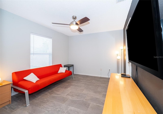 146 Hidden Pointe Ln, Groveland, FL 34736 - sitting room with a ceiling fan and baseboards