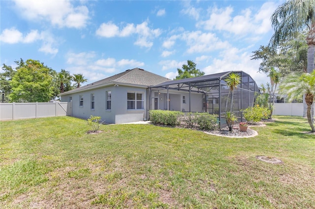 10417 Oakview Pointe Ter, Gotha, FL 34734 - rear view of property with stucco siding and glass enclosure