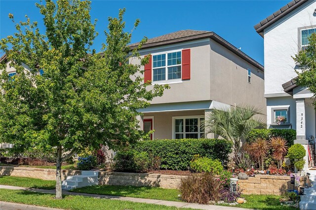 9348 Meadow Hunt Way, Winter Garden, FL 34787 - view of front of house with stucco siding