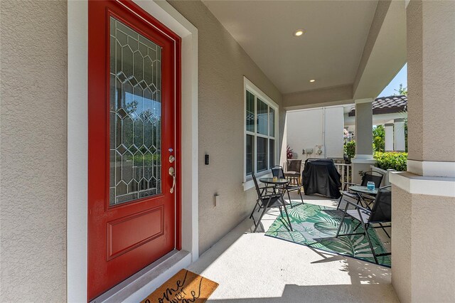 9348 Meadow Hunt Way, Winter Garden, FL 34787 - entrance to property with stucco siding