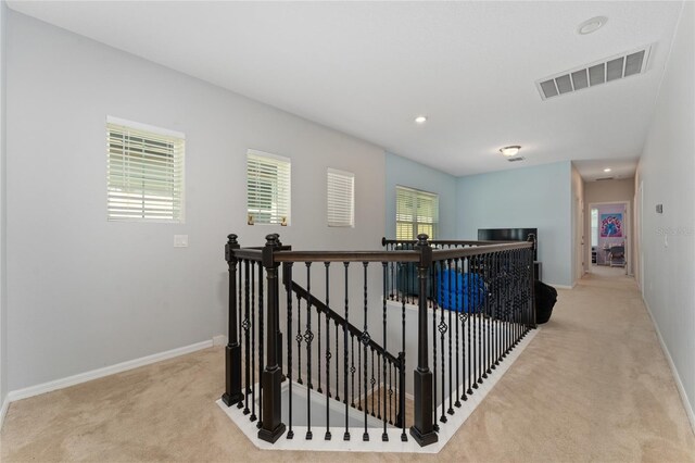 9348 Meadow Hunt Way, Winter Garden, FL 34787 - hall with an upstairs landing, carpet floors, baseboards, and recessed lighting
