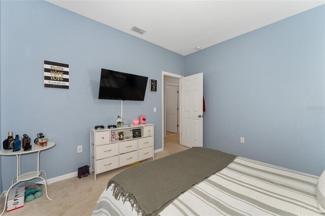 9348 Meadow Hunt Way, Winter Garden, FL 34787 - bedroom with light carpet and baseboards