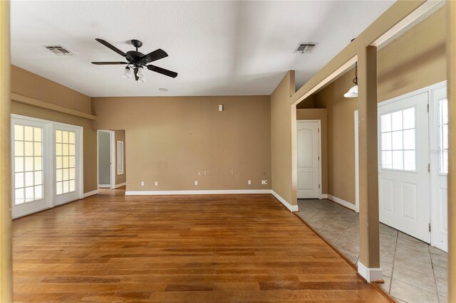 16017 Johns Lake Rd, Clermont, FL 34711 - unfurnished room featuring a ceiling fan, light wood-type flooring, and baseboards