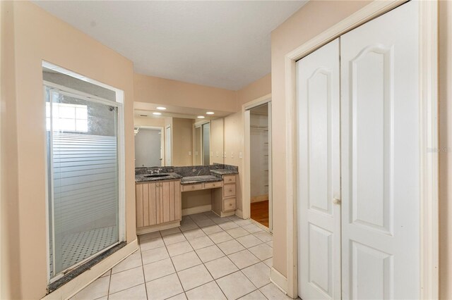 16017 Johns Lake Rd, Clermont, FL 34711 - full bath featuring a stall shower, vanity, tile patterned floors, baseboards, and recessed lighting