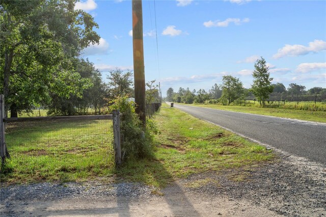 16017 Johns Lake Rd, Clermont, FL 34711 - view of asphalt road featuring a rural view