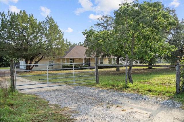 16017 Johns Lake Rd, Clermont, FL 34711 - view of front of property with a gate