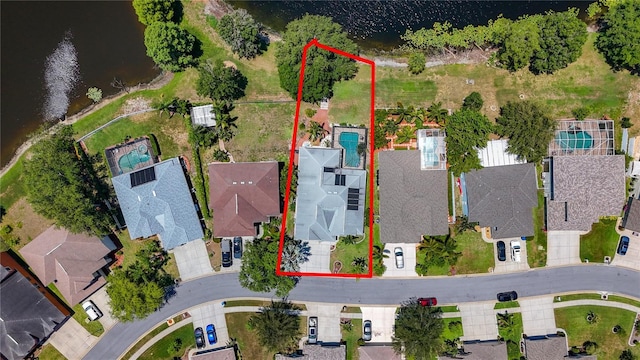 1913 Blue River Rd, Holiday, FL 34691 - aerial perspective of suburban area featuring a nearby body of water and property boundaries highlighted