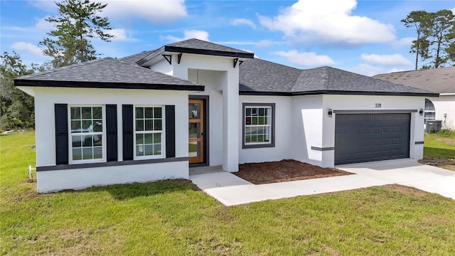 3211 SW 128th Street Rd, Ocala, FL 34473 - view of front facade with roof with shingles, stucco siding, an attached garage, driveway, and a front lawn