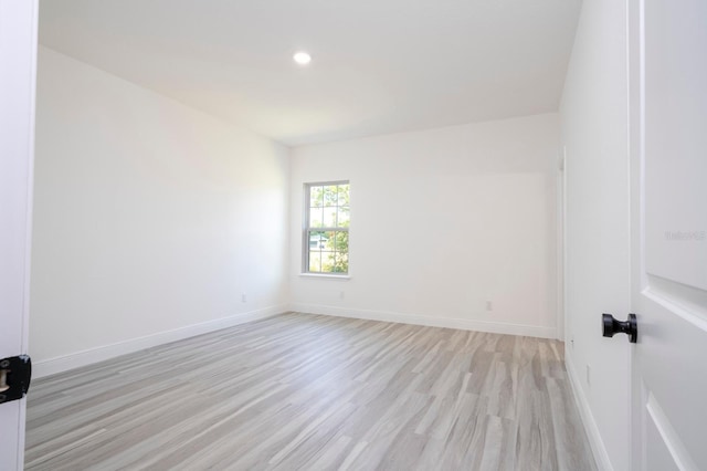 3211 SW 128th Street Rd, Ocala, FL 34473 - spare room with light wood-type flooring, baseboards, and recessed lighting