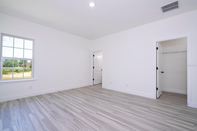 3211 SW 128th Street Rd, Ocala, FL 34473 - unfurnished room with light wood-type flooring, baseboards, and recessed lighting