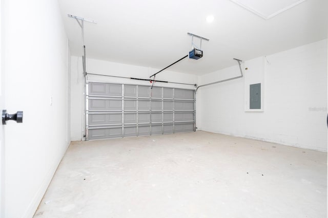 3211 SW 128th Street Rd, Ocala, FL 34473 - garage featuring electric panel and a garage door opener