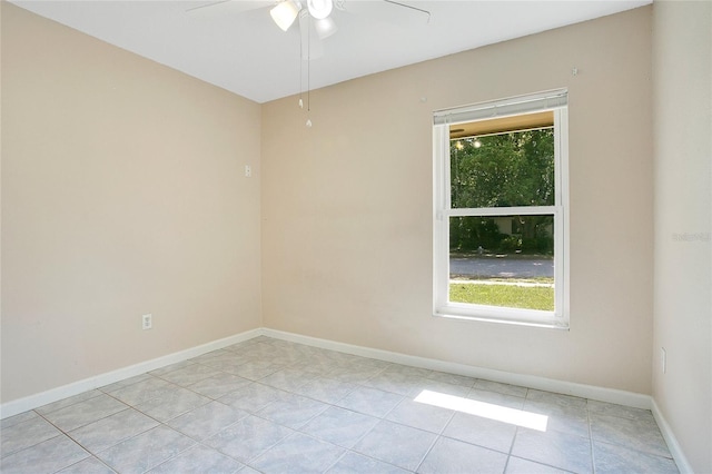 3431 Hunt Ln, Oviedo, FL 32765 - empty room with ceiling fan, light tile patterned floors, and baseboards