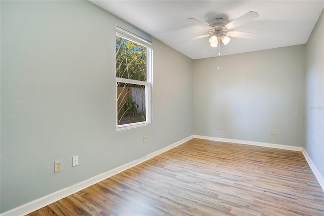 3431 Hunt Ln, Oviedo, FL 32765 - empty room featuring a ceiling fan, light wood-style floors, and baseboards